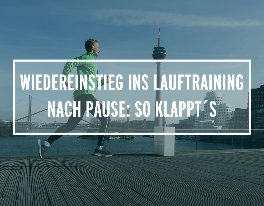 Läufer auf einer Brücke im Düsseldorfer Medienhafen